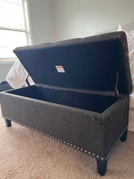 Photo of free Gray storage bench (Near PNC Arena) #2