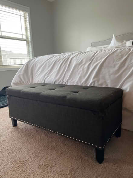 Photo of free Gray storage bench (Near PNC Arena) #1