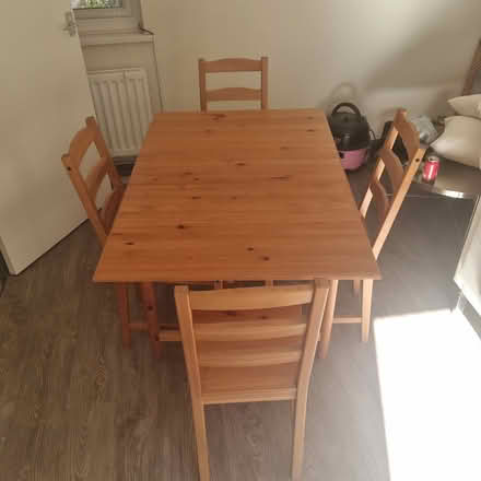 Photo of free Pine drop leaf table with 4 chairs (Shottermill GU27) #1