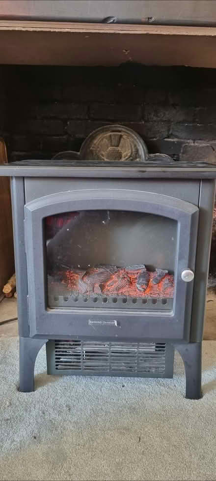 Photo of free faux wood burner heater (PO18) #1
