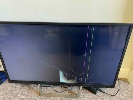Photo of free Broken screen - Sony tv with stand and charger (Sion Hill) #1
