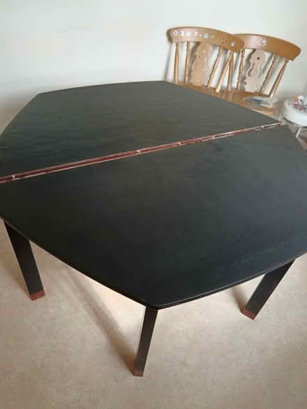 Photo of free Large extendedable solid wooden table. Been painted black (Cainscross GL5) #3