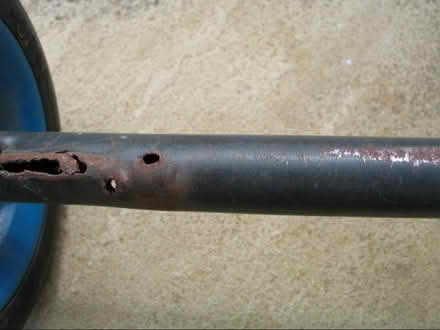 Photo of free 2 wheels approx. 19cms diameter & axle. Solid tyres (Upton Saint Leonards GL4) #3