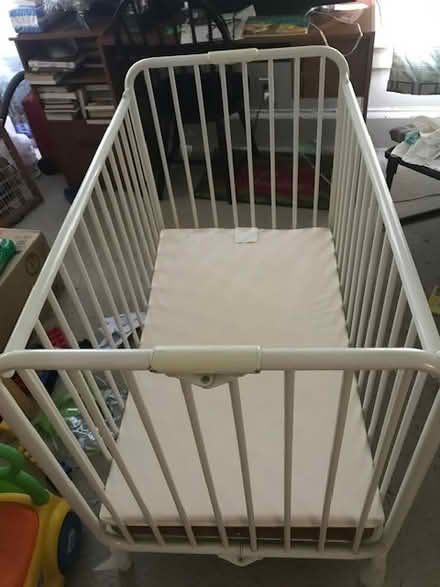 Photo of free Mini foldable metal crib (Rochester) #1