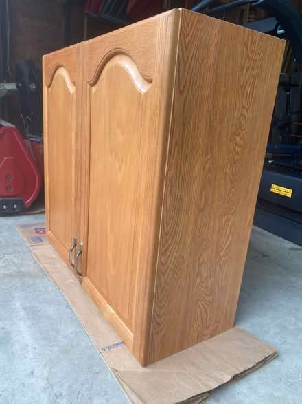 Photo of free Laundry Cabinet (West Glen subdivision) #1