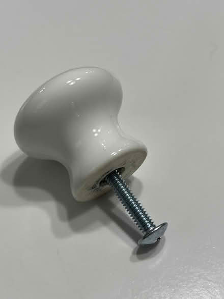 Photo of free 3/4” white ceramic cabinet knobs (Roswell) #2