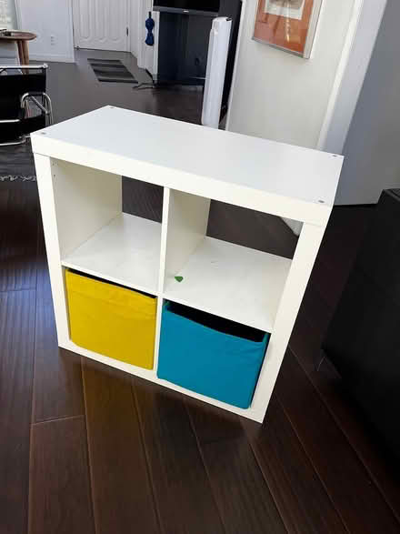 Photo of free Ikea Kallax 4-cube shelving unit (Wolfe and Evelyn) #1