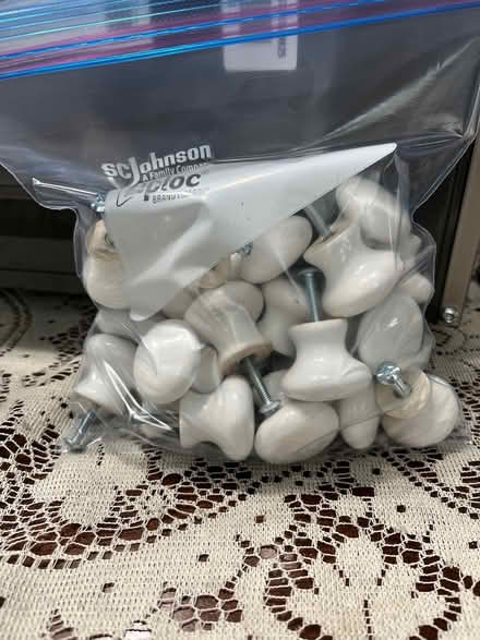 Photo of free 3/4” white ceramic cabinet knobs (Roswell) #1
