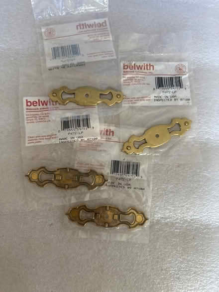 Photo of free 4 brass pull knob plates (Hollenbeck and Remington) #1