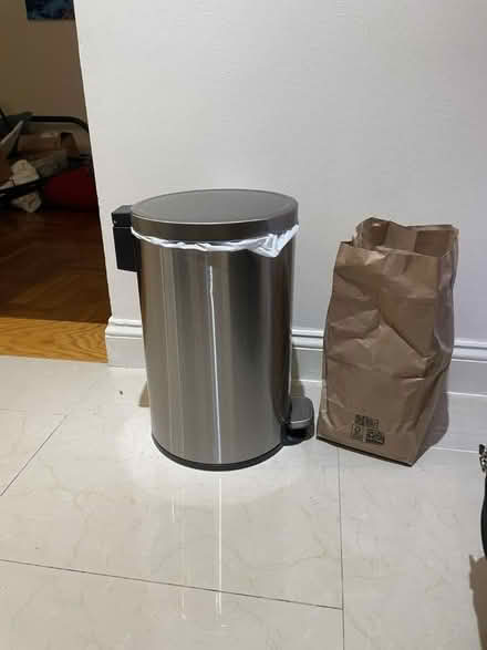 Photo of free Small Silver Trashcan (56 West 65th Street) #1