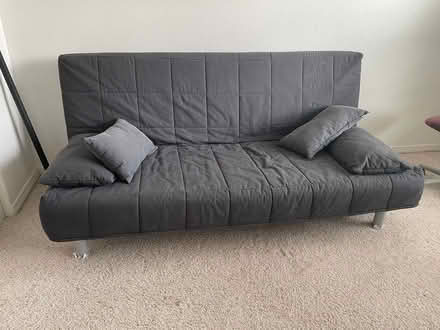 Photo of free Gray futon (Near 115th & Sheridan) #1