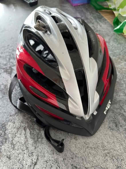 Photo of free Bicycle helmet (red, black and silver) unisex size 54-61cm (Cubitt Town E14) #2