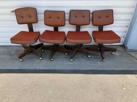 Photo of free FOUR (4) brown office chairs (515 12th St. Huntington Beach) #1