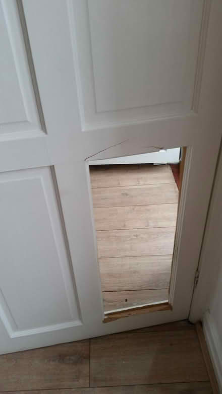 Photo of free Damaged white door (North Reddish Stockport) #1