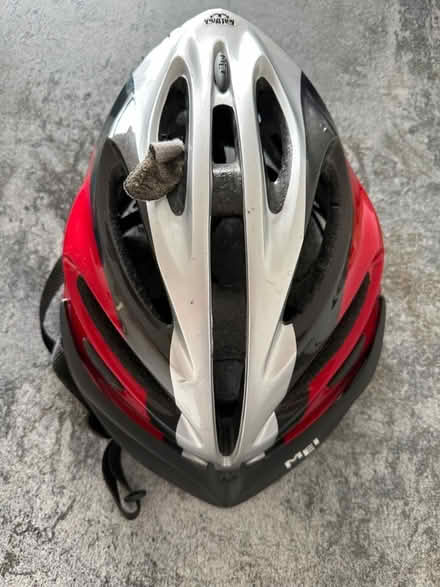 Photo of free Bicycle helmet (red, black and silver) unisex size 54-61cm (Cubitt Town E14) #1