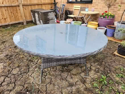 Photo of free Large rattan and glass Garden table (Lostock Hall PR1) #1