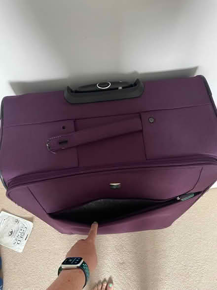 Photo of free Large purple suitcase (SW11 1EG) #2