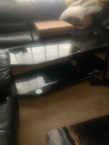 Photo of free Glass Black tv stand (B38) #1