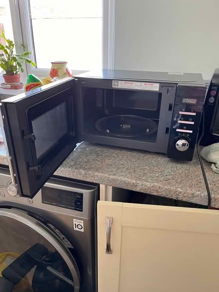 Photo of free Microwave (Mandeville DT4) #1