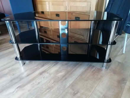 Photo of free Black glass TV stand (Newall LS21) #1