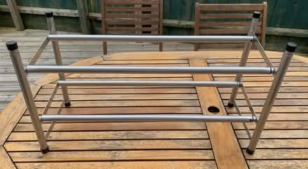 Photo of free Adjustable width shoe rack (Bassingbourn-cum-Kneesworth SG8) #1
