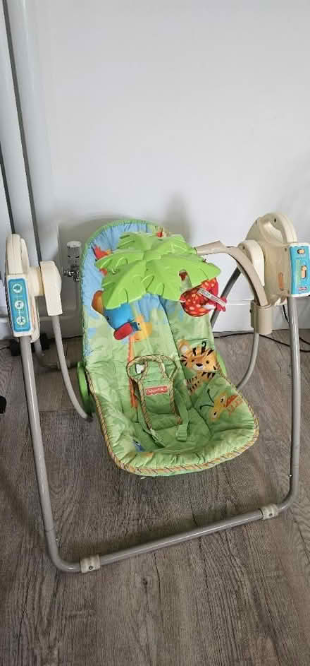 Photo of free Baby swing chair/baby clothes (GU22) #1