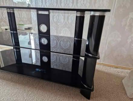 Photo of free John Lewis Black glass TV stand (Birstall LE4) #2