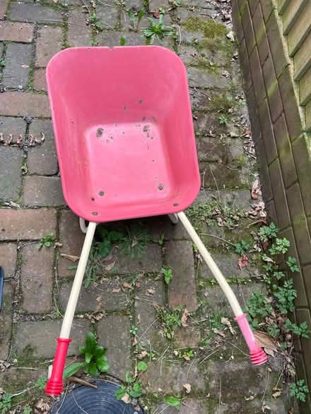 Photo of free Small metal wheelbarrow for child (East Grinstead) #1