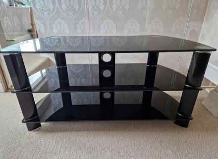 Photo of free John Lewis Black glass TV stand (Birstall LE4) #1