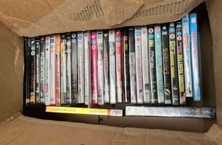 Photo of free DVDs box full. Great titles (WA15 (Hale)) #1