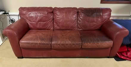 Photo of free Red Leather sofa (Belmont)