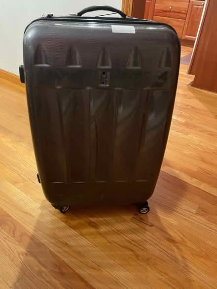 Photo of free Large hard shell suitcase (South acton) #1