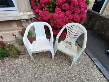 Photo of free 2 white plastic patio chairs (Bear Flat) #1