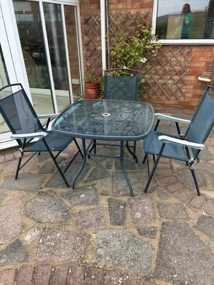 Photo of free Glass and metal table and 3 chairs (Flackwell Heath HP10) #1