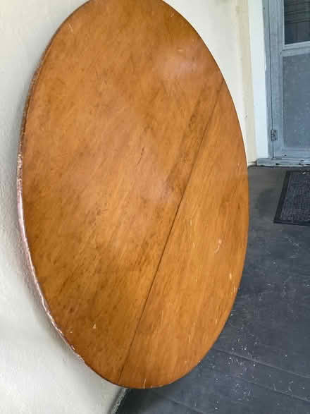 Photo of free Large round wood table (47.5”) (Dobbs Ferry) #1