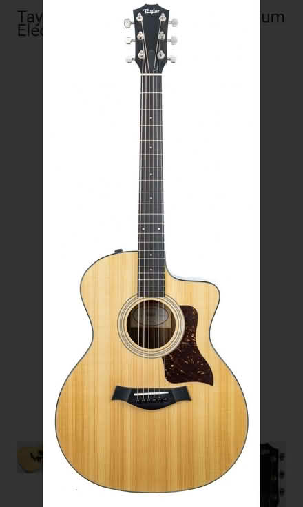 Photo of An acoustic guitar (Harlow Essex CM20 1JQ) #1