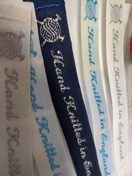 Photo of free 6 little woven tape labels saying Hand Knitted In England (Harley Shute TN38) #2