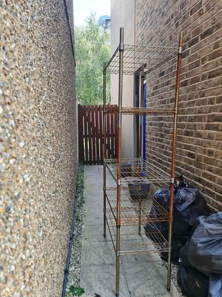 Photo of free Tall metal shelf- ideal for garage (Ashford TW15) #1