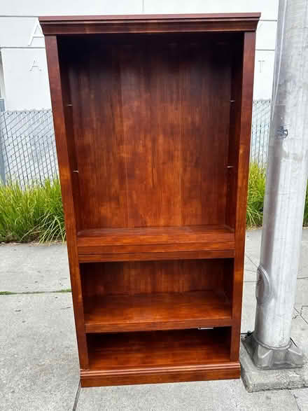Photo of free Tall wood shelf unit (Albany CA) #1