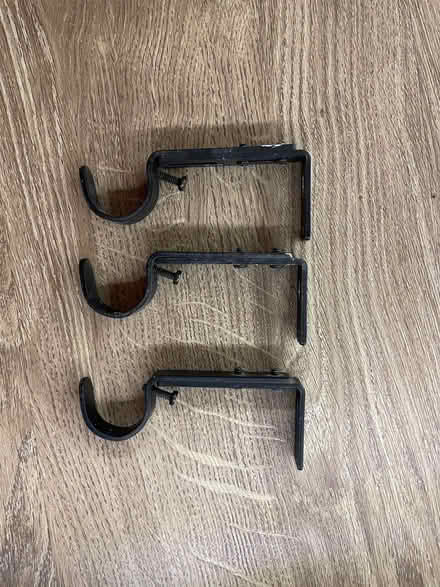 Photo of free 3 black curtain pole brackets (Finchampstead RG40) #1