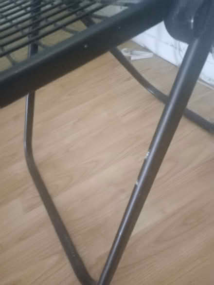 Photo of free Single black metal foldable dining chair. (West Croydon CR0)