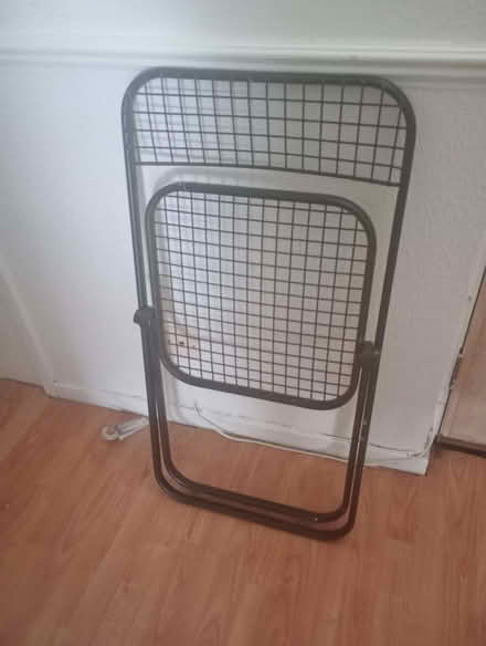 Photo of free Single black metal foldable dining chair. (West Croydon CR0)