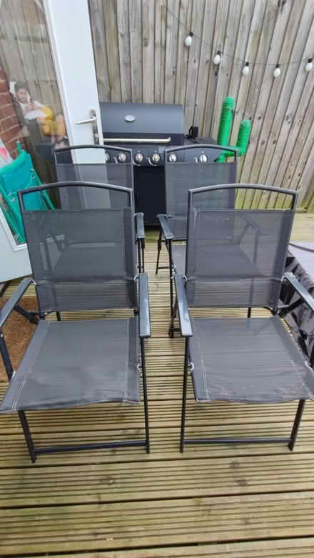 Photo of free 4x black garden chairs (Abbotswood, Romsey) #1