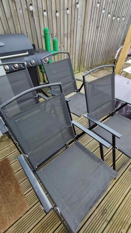 Photo of free 4x black garden chairs (Abbotswood, Romsey) #2