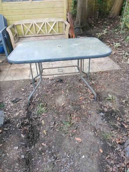 Photo of free Large glass topped garden table (St Helens TN34) #1