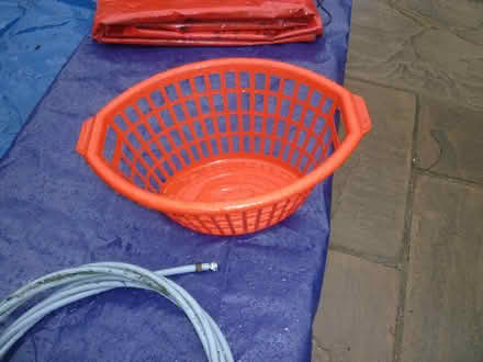 Photo of free Red laundry basket (welling DA16) #1