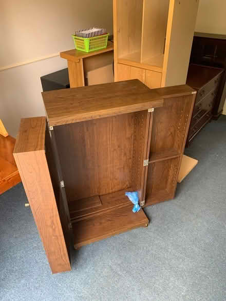 Photo of free Oak effect media storage cupboard (Werrington) #2