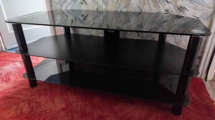 Photo of free Black glass tv/hifi unit (Parr WA9) #1