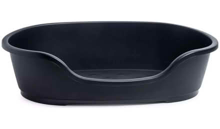 Photo of free large brown plastic dog bed (Market Warsop NG20) #1