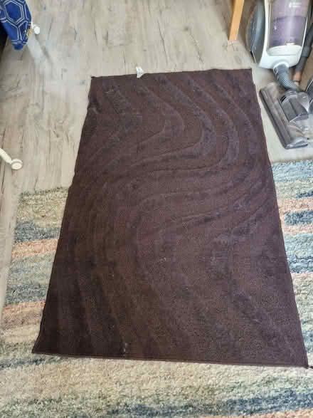 Photo of free Small dark brown rug (Sainsburys GL52) #1